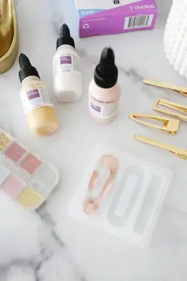 barrette mold, barrette clips, and liquid clay bottles