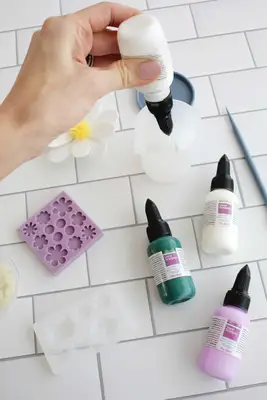 pouring liquid sculpey into cup