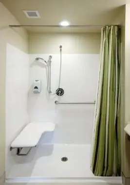 Sprchy s koľajnicami