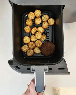 tator tots and a hamburger in air fryer