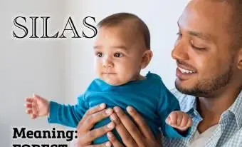 Padre che tiene in braccio il bambino