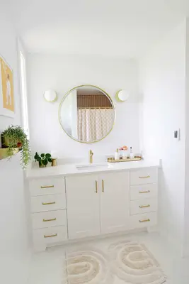 Bright bathroom with gold fixtures
