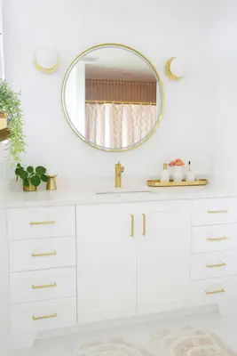 Bright bathroom with gold fixtures