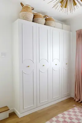 IKEA Pax wardrobes with arched trim added