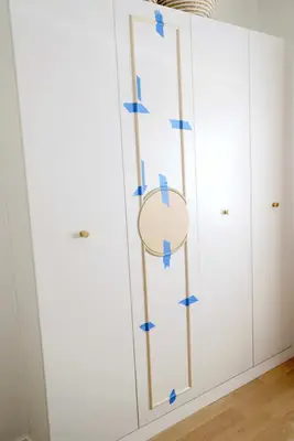 IKEA Pax wardrobes with arched trim added around circle guide