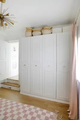 white built in closet in room