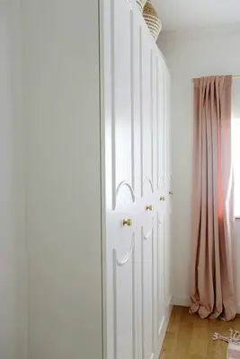 white built in closet in room