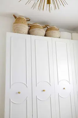 white built in closet in room