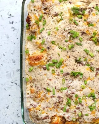 biscuits and gravy casserole in a glass pan