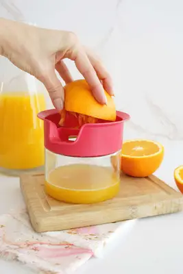 squeezing orange juice