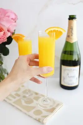 mimosa with orange wedge