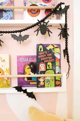 close up of haunted house halloween book