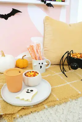 close up of ghost cookie and candy corn snacks