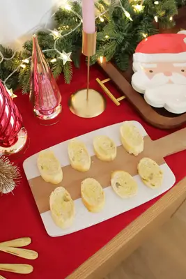 toasted bread slices on marble board