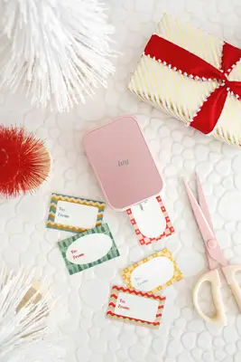 gift tags being printed with the ivy 2 mini photo printer