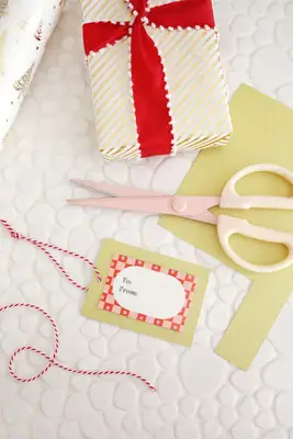 presents wrapped with gift tags attached