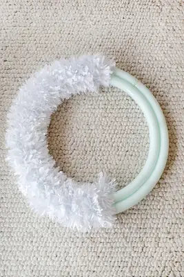 Easy Oversized Christmas Wreath DIY (With Pool Noodles!)