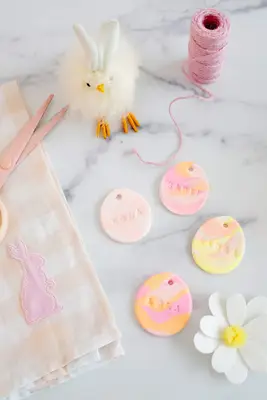 air dry clay name tags shaped like marbled eggs