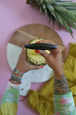 making a pineapple cup for a pina colada