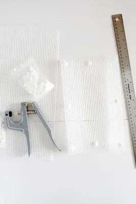 mash covers with snaps, ruler, and snap setter next to it