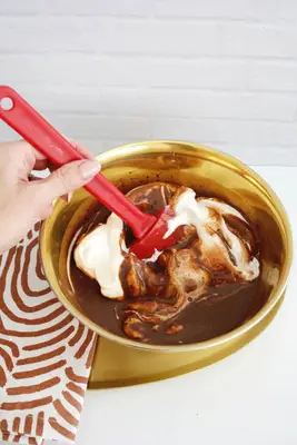 adding cool whip to chocolate pudding shots