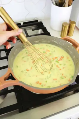 making chicken pot pie filling