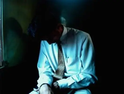 Empresário nas sombras