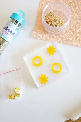 earring mold with just the yellow part poured