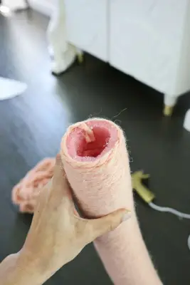 yarn wrapped all around a pool noodle