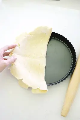 Rolling out dough for easy apple tart