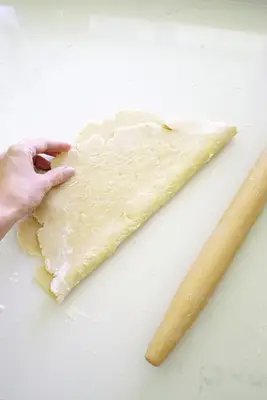 Rolling out dough for easy apple tart
