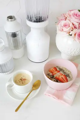 coffee and smoothie bowl in front of beast blender