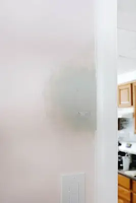 the mudded over hole on a pink wall