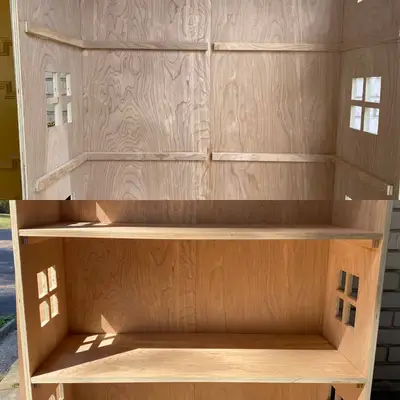 the inside of the wooden unpainted dollhouse