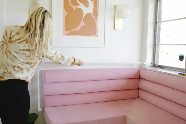 placing the wood trim on the banquette