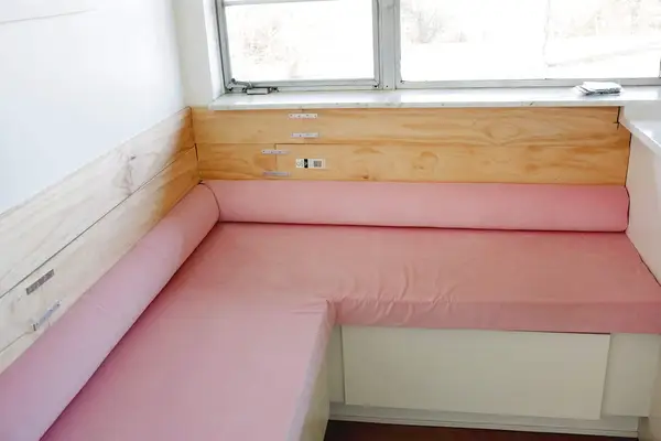 banquette with start of channel tufted backing