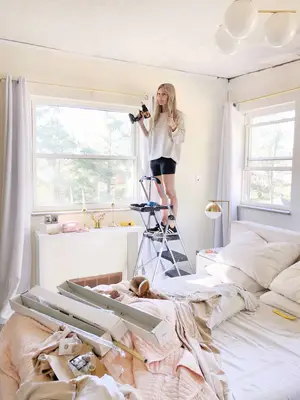 women renovating a bedroom