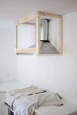 wood frame around hood vent