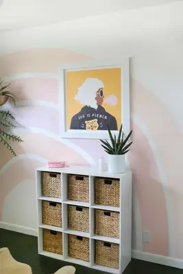 art painting on wall where rainbow is painted