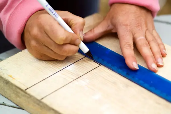 Making a raised bed - measuring the wood