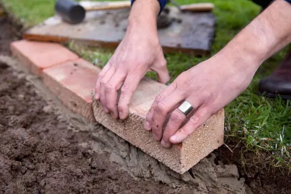 How to edge a lawn with bricks
