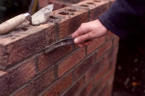 Using a hosepipe to neaten the joints