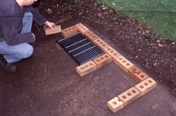 Laying out the barbecue bricks