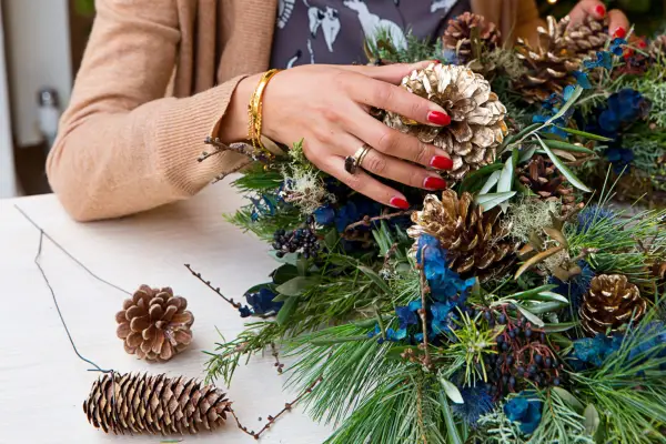 Adding a sprayed pinecone to the birch base