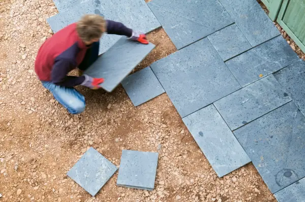 Arranging the patio slabs