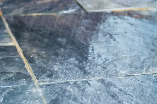 Washing the patio slabs