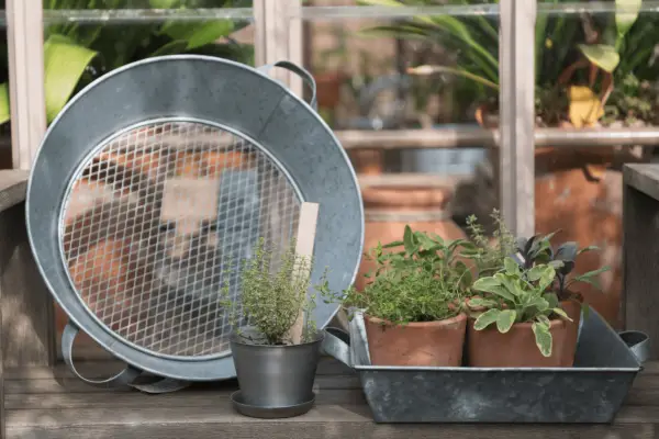 How to make a soil sieve - screwing the frames together