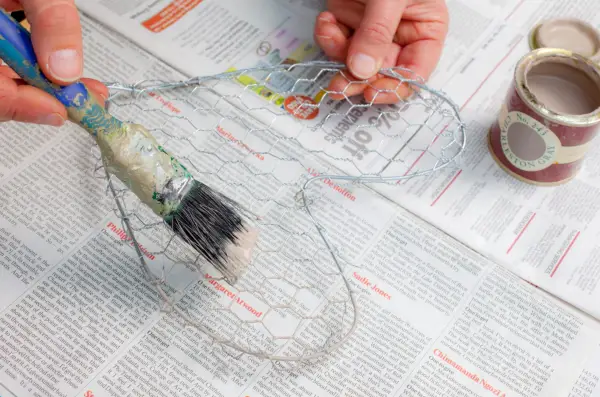 Painting the wire hearts