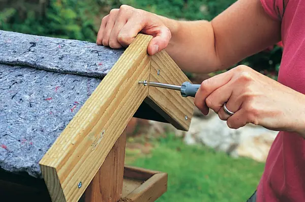 Screwing the battens into place