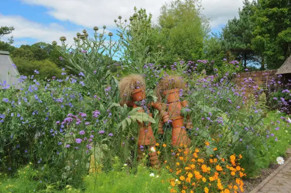 Alternative scarecrows made using terracotta pots